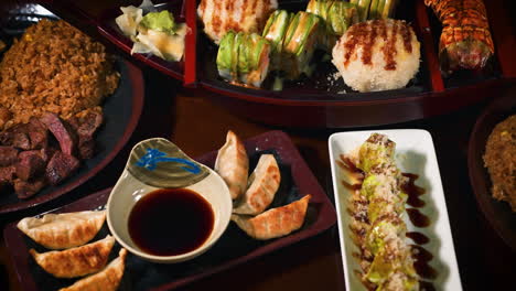 variety of options at japanese hibachi grill restaurant including fried rice sushi tempura gyoza stir fry, slider 4k