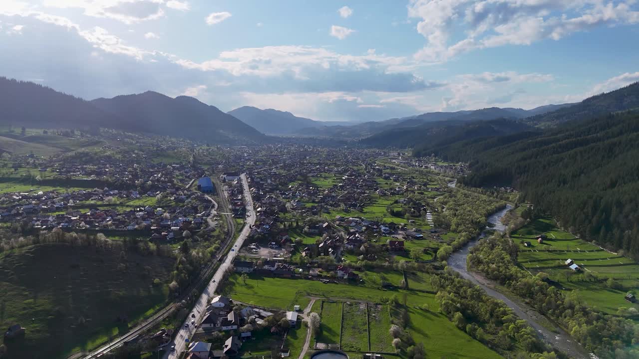 Drone shot of Campulung city on sunny day with nature
