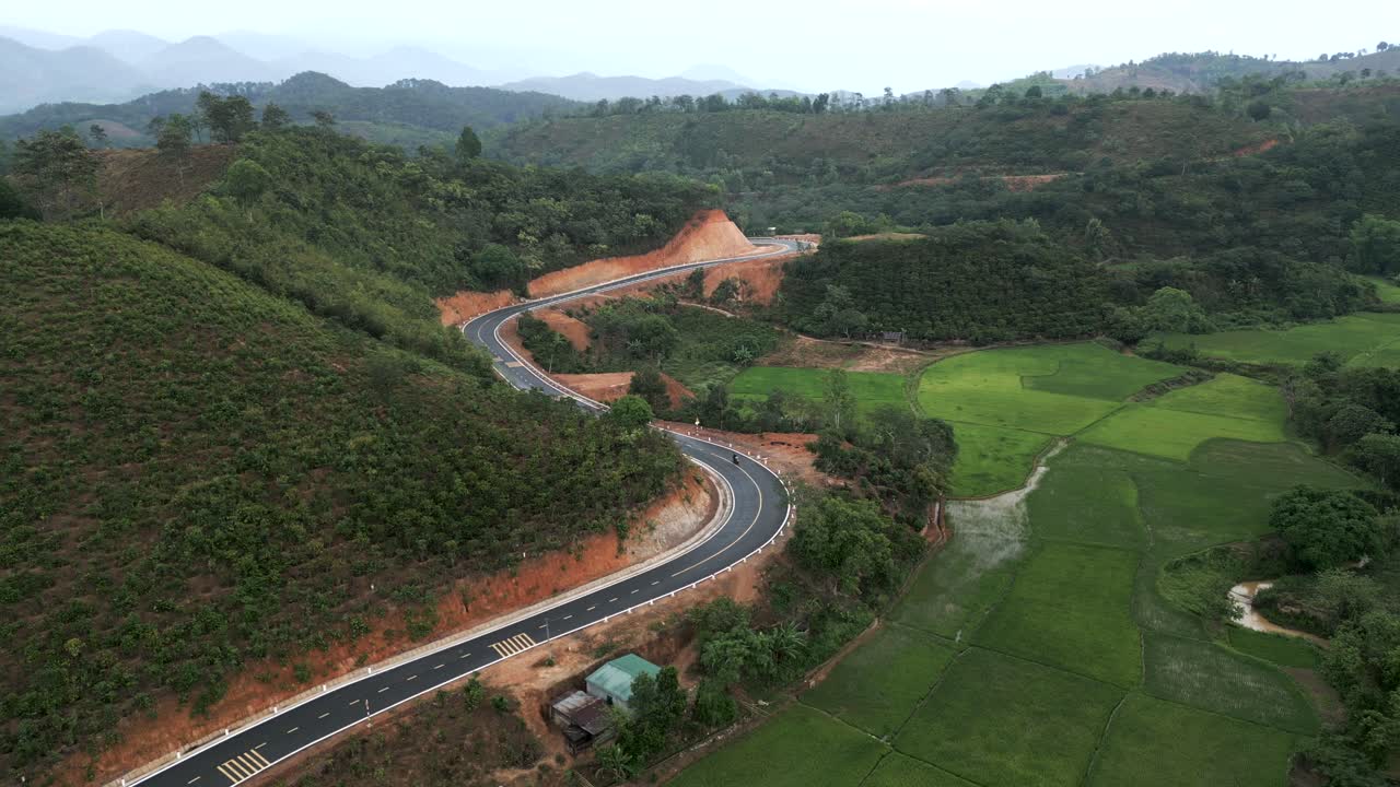Mountain Winding Road with Rice Paddy Fields