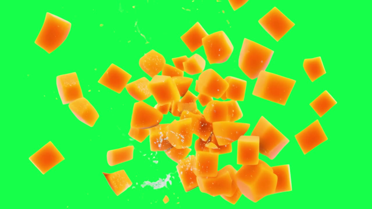 Pezzi di Mango che Esplodono con uno Schizzo su Schermo Verde