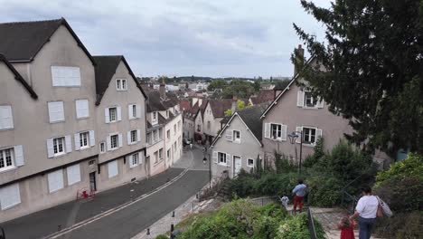 old town chartres, the view from above, and staircase were family with children descends. france.