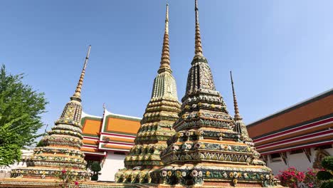 colorful pagodas in wat pho temple, bangkok