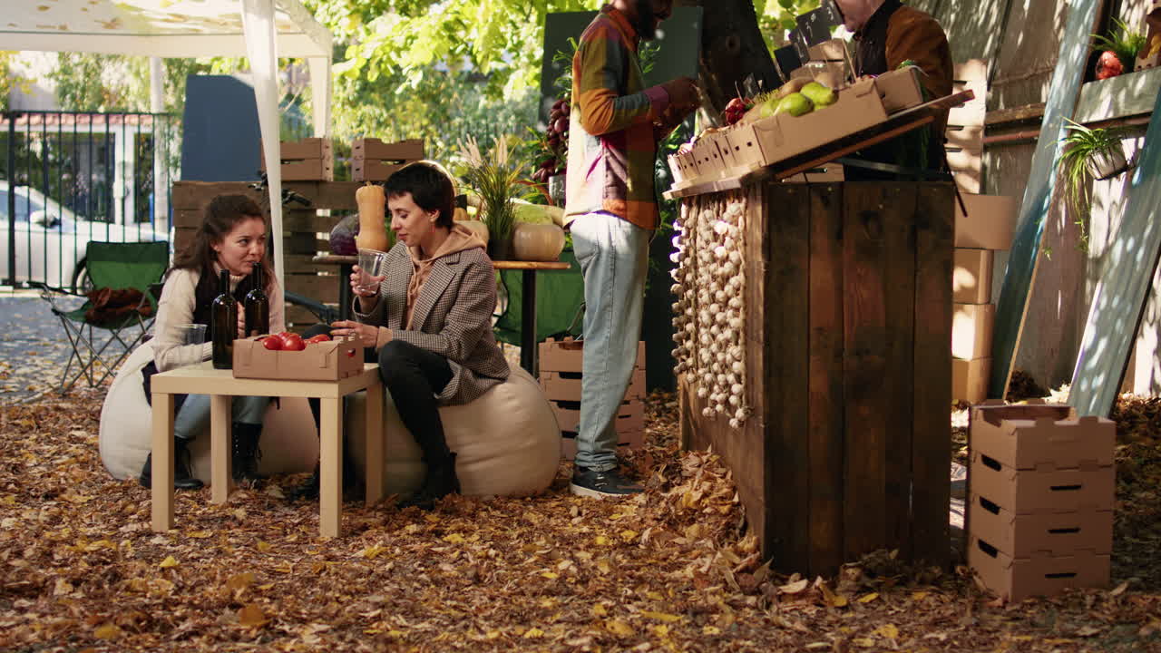 People at an outdoor market in the fall