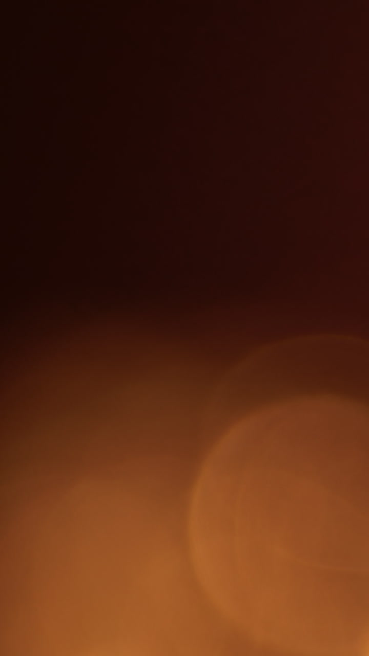 Effetto luce bokeh arancione caldo e morbido con dissolvenza graduale