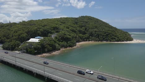 Scene-Of-Daytime-Traffic-At-Tallebudgera-Creek-Bridge-In-Burleigh-Heads,-Queensland,-Australia