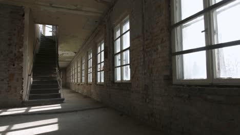 slow pan in an abandoned corridor with stairs