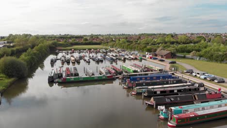 Canal-Boat-Marina-Bay,-Hinckley,-UK---Aerial,-Dolly-in-flight-over