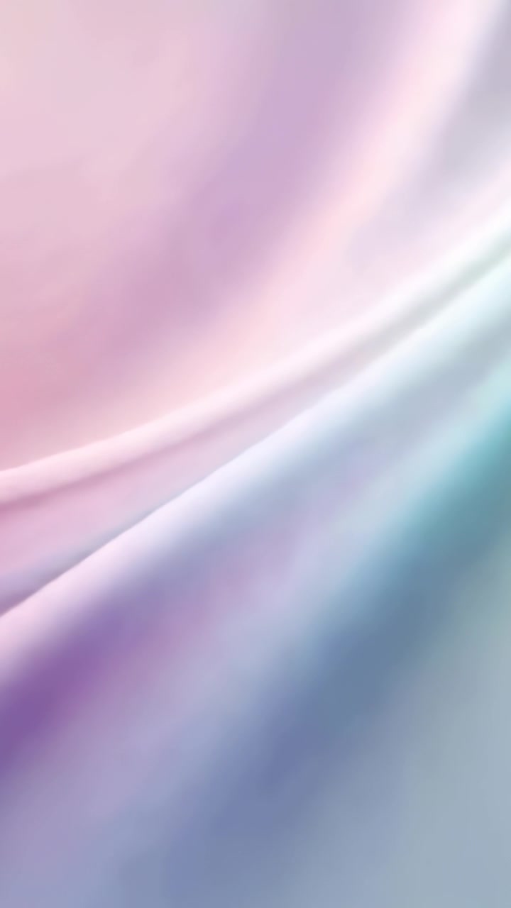 Vertical video: Shifting light causing pastel gradient surface rippling in studio, creating calm