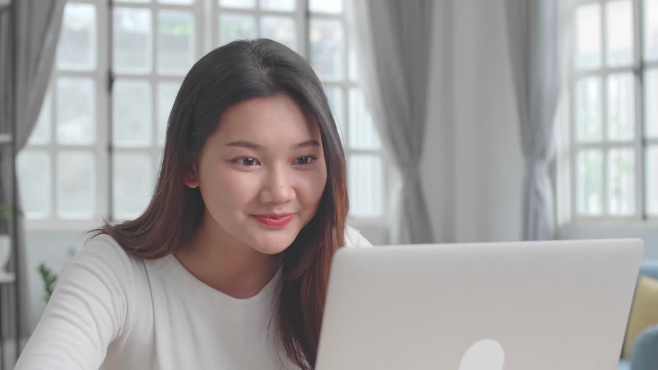 Happy Woman Celebrating Online Success