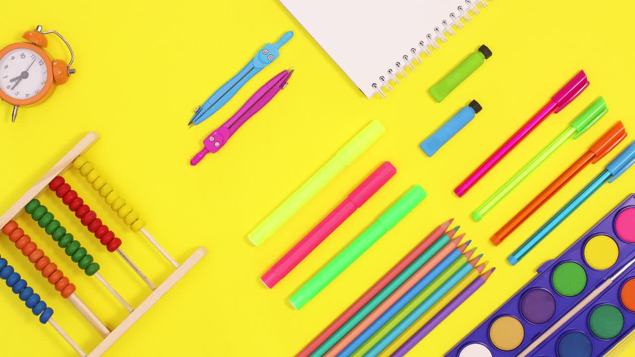 School stationery make creative back to school pattern on yellow theme. Stop motion