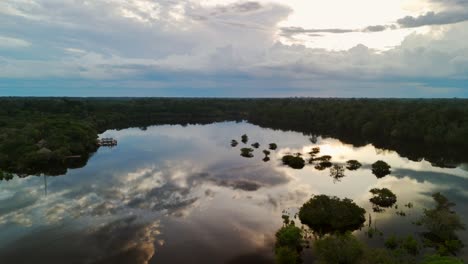 beautiful skyline reflection in the peaceful waters of the juma river banks, amazonas, brazil