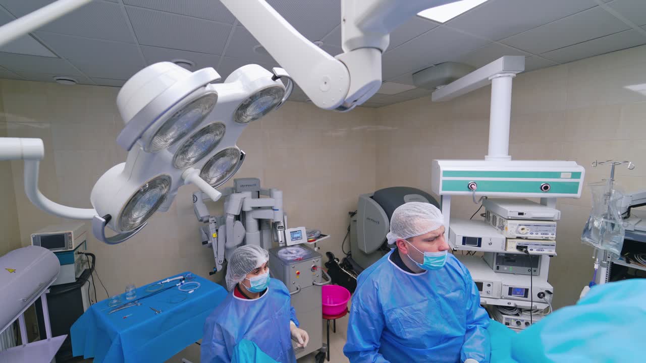 Surgery team in the operating room. Team surgeon at work in operating room