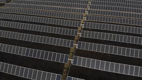 sunlight reflects on solar panels array in a rural farm in western region in new york, usa