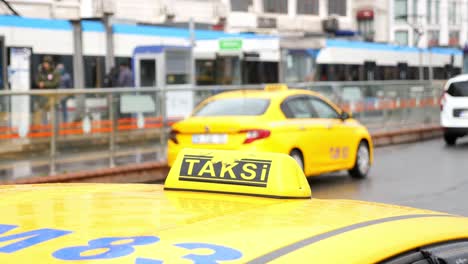 yellow taxi in a city street