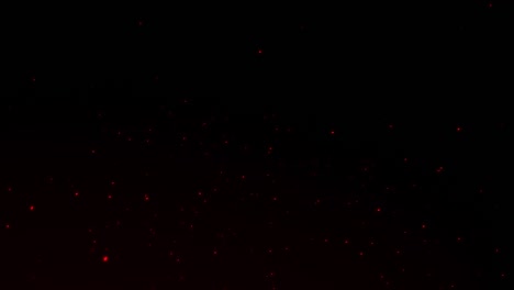 las chispas de fuego de 4k brillan en el fondo de las partículas