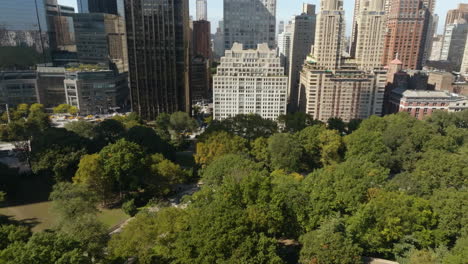 central park with the upper east side skyline background, in sunny ny - aerial view