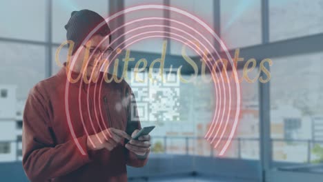 animation of united states text and qr code over caucasian man using smartphone