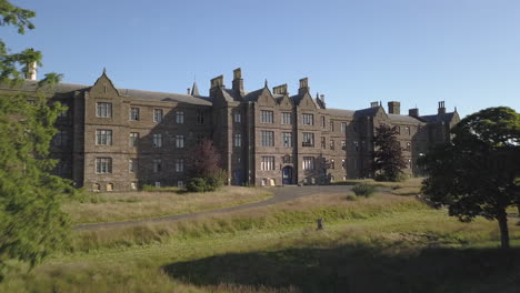 Aerial-view-of-Sunnyside-abandoned-hospital,-Montrose,-Angus,-Scotland