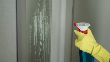 cleaning a glass door or window