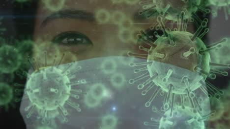 animación de células macro coronavirus covid-19 que se extienden sobre una mujer biracial que lleva una cara