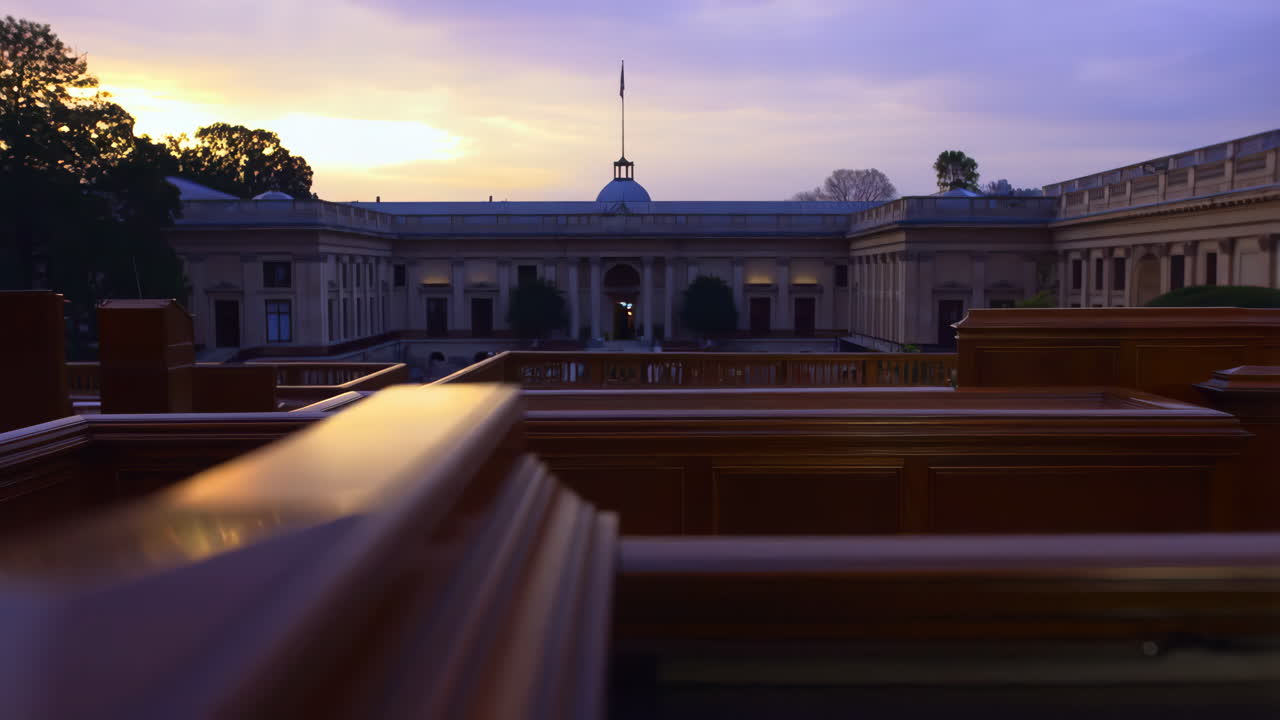 Majestic Building Facade at Twilight with Vibrant Sky