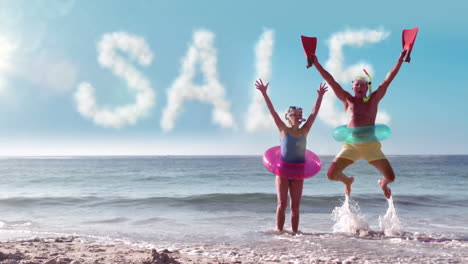 Senior-couple-jumping-at-the-beach