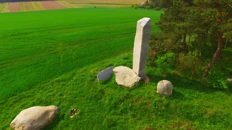 camera flight around ancient stone monument. menhirs and dolmens near tesovice. famous place for every year rituals of fertility treatment. mysterious landmark in czech republic, central europe.