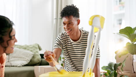 couple painting furniture together at home
