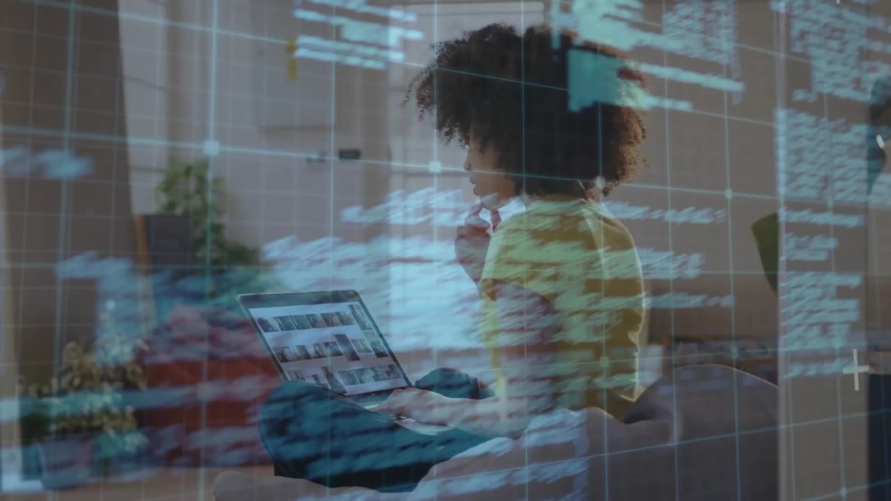 yellow-shirted woman typing code on laptop and debugging with technology grid overlay browsing pics