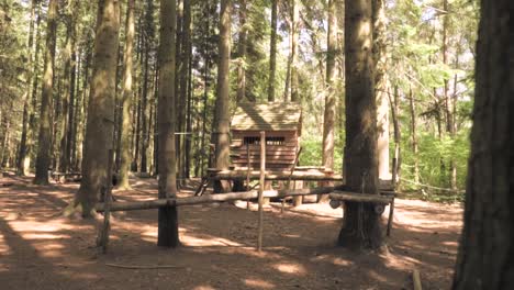 wooden playhouse in a forest