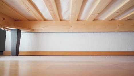 Dusty-floor-under-the-bed-getting-vacuum-cleaned