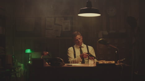 detective examining a gun in a retro office