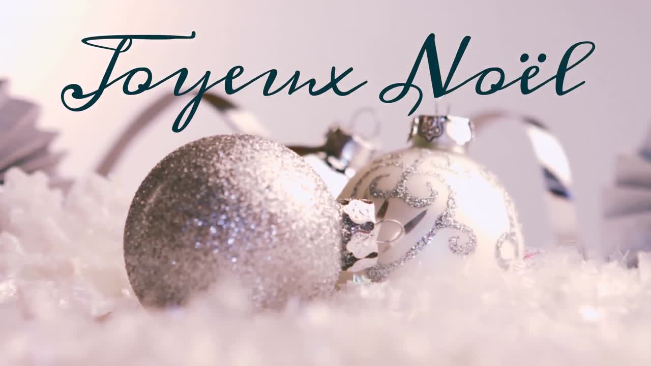 Joyeux No&Atilde;&laquo;l written over Christmas decorations