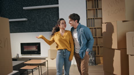 family planning new interior standing in apartment living room full carton boxes