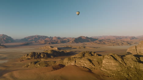 hot air balloon on flight over wadi rum desert in jordan