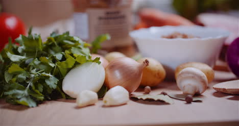 fresh food ingredients on wooden table in kitchen 16