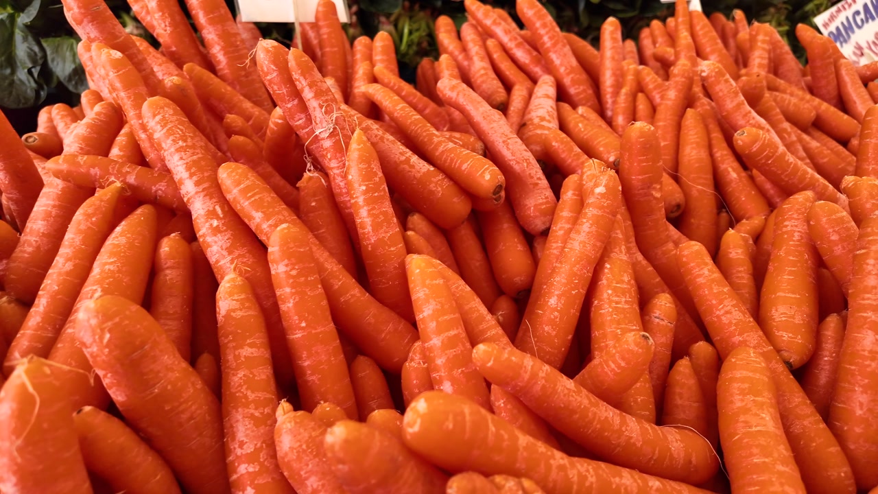 Close-up View of Fresh Orange Carrots on Display
