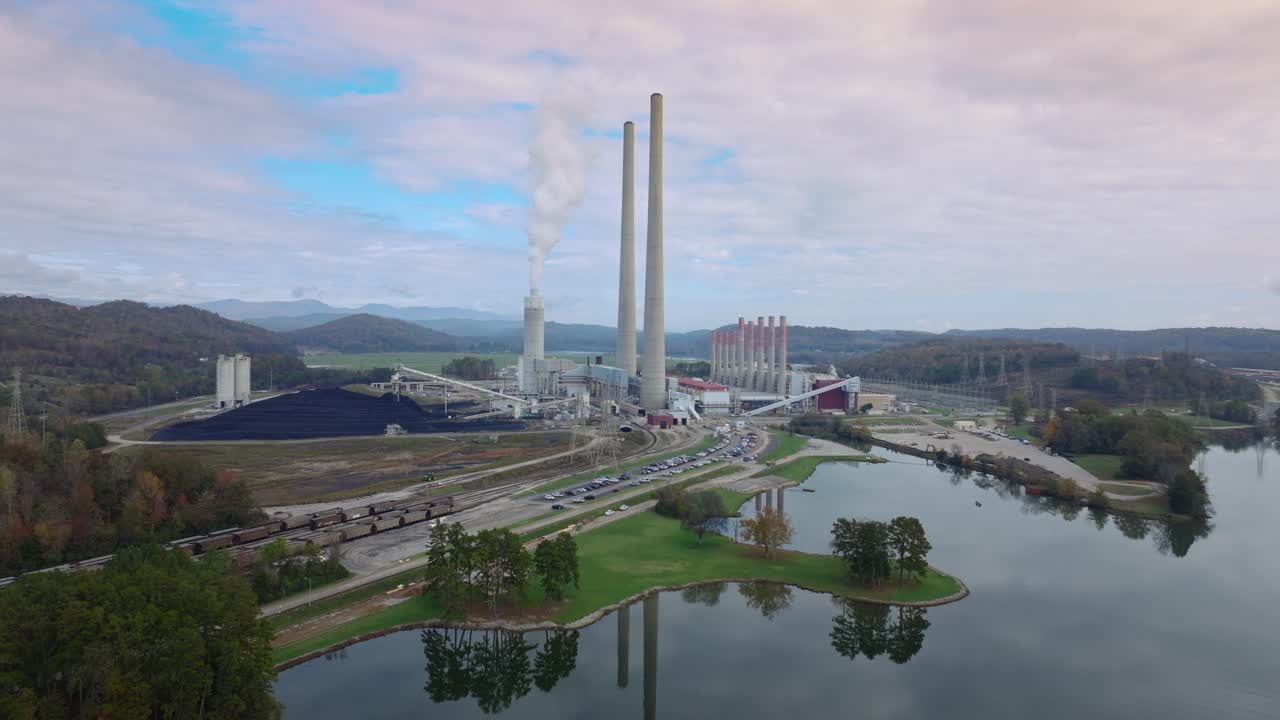 Aerial view of Kingston coal plant by a lake in Tennessee, serene setting