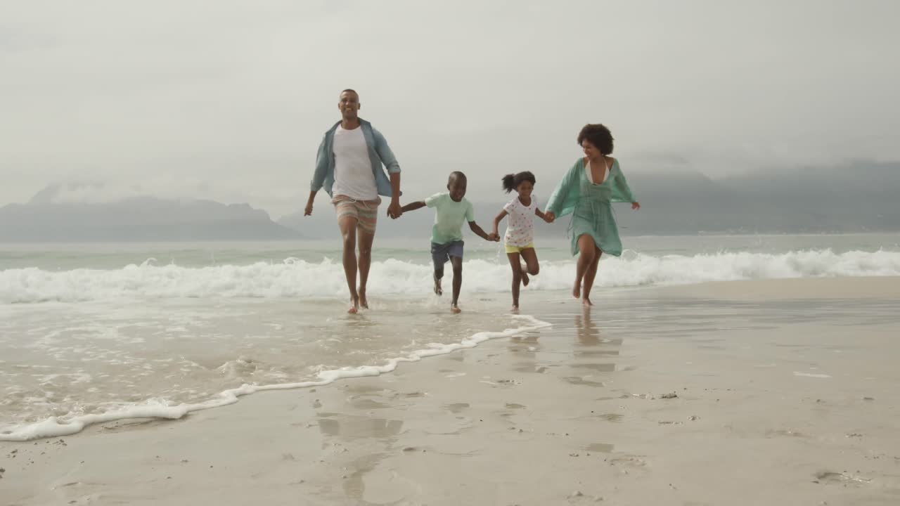 Family enjoying free time by the sea
