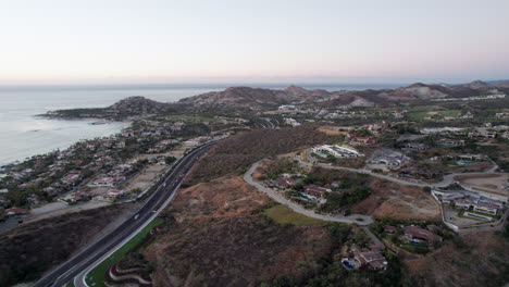 flying over a coastal highway in los cabos, mexico