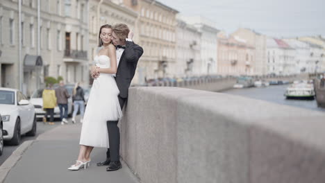 elegant bride and groom in cityscape