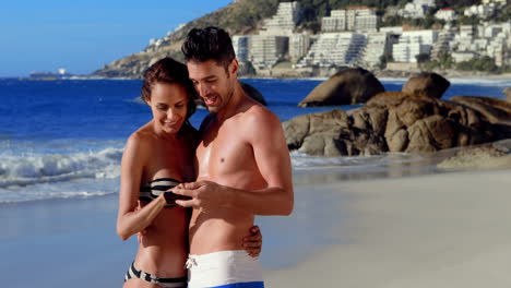 happy couple taking selfie