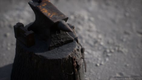 old anvil attached to a stump