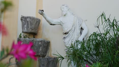 statue of jesus christ located outside a church