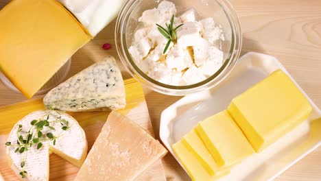 variety of cheeses and dairy items displayed