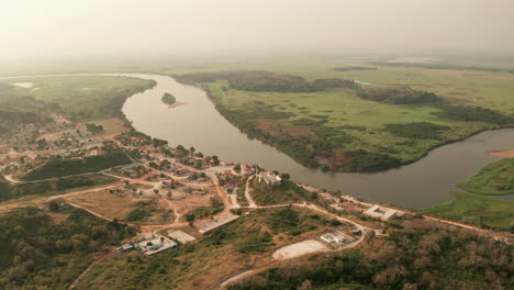 traveling-front,-Muxima,-place-of-religious-worship,-Angola,-Africa,-the-Kwanza-river-in-the-background