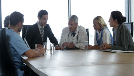 Businessman talking to a medical team