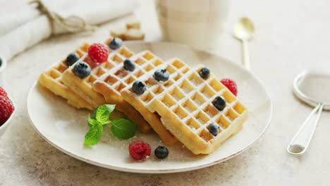 Waffles-and-berries-on-plate