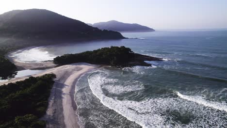 drone orbital flyght over an island