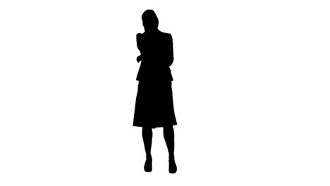 silhouette of a woman talking on her mobile phone